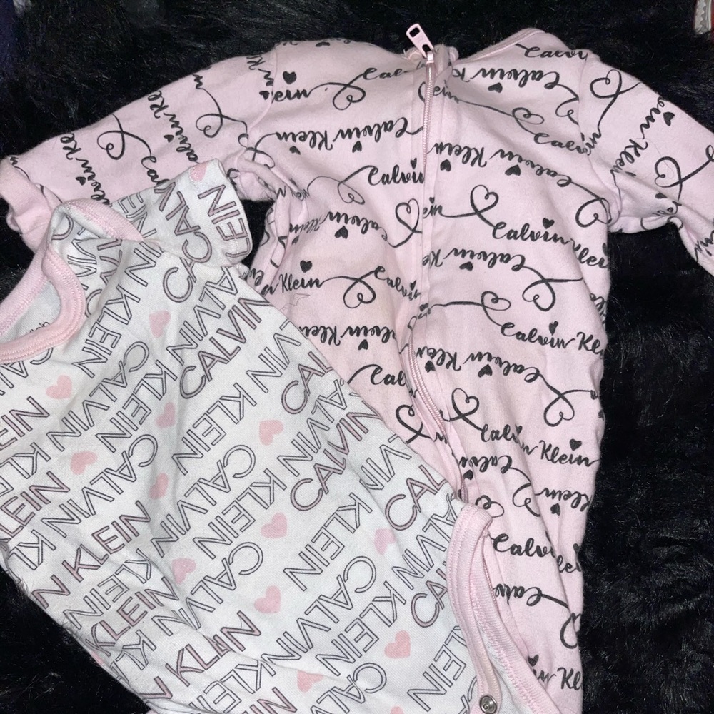 baby girl onesie and sleeper pjamas 0-3 months worn one time Calvin Klein